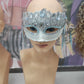 Silver and blue masquerade mask with tassels