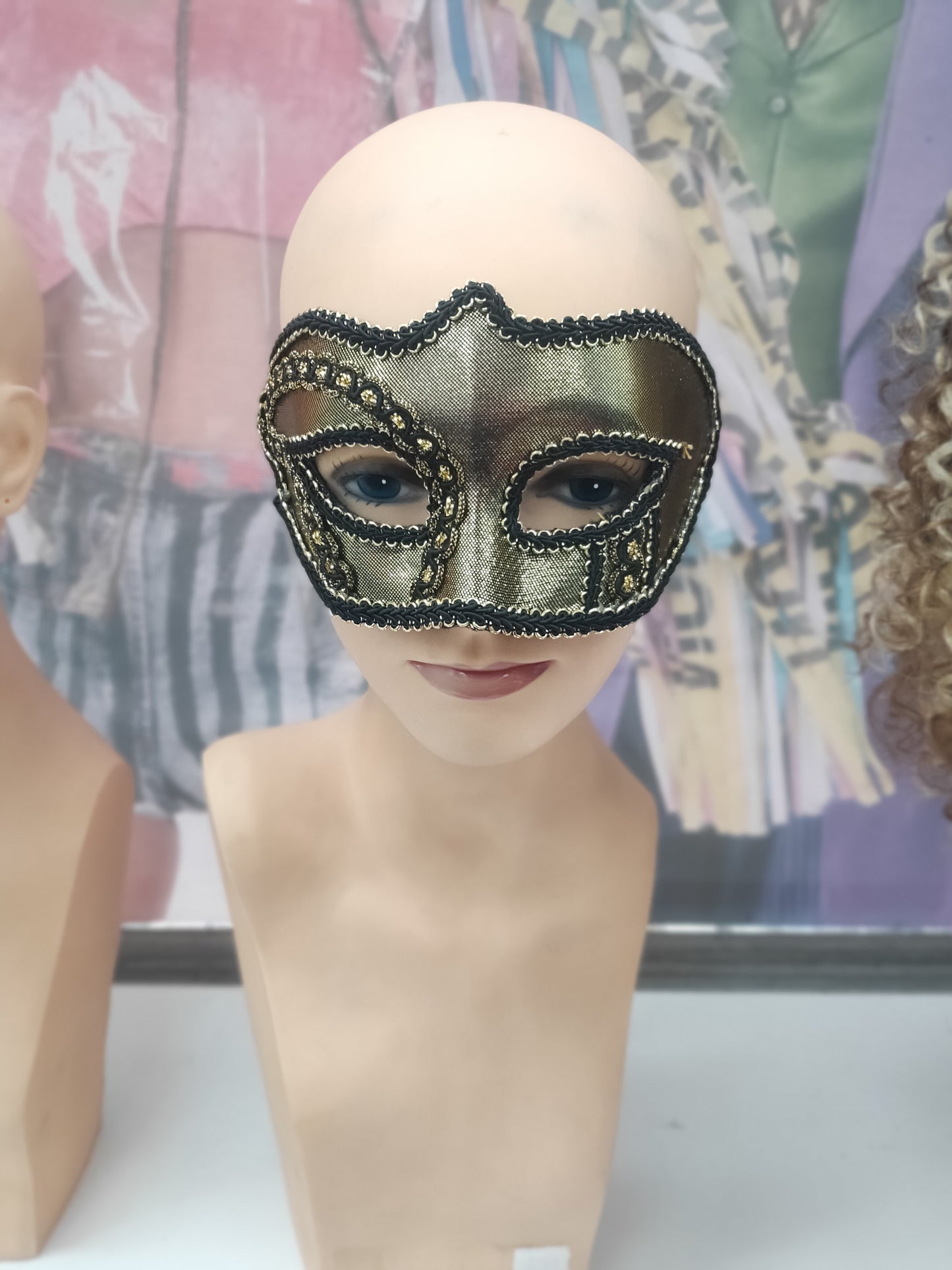 Black and gold masquerade mask