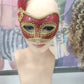 Red and Gold masquerade mask with side feather